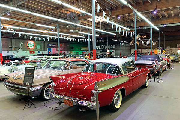 Classic cars on display inside a museum